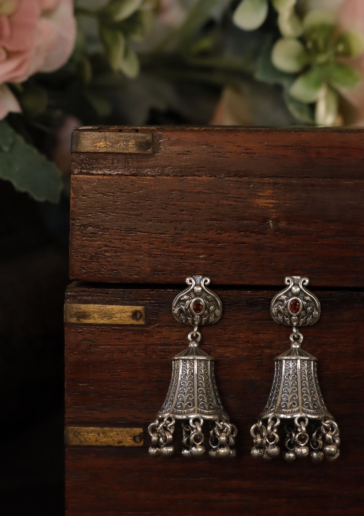 Saarika Silver Jhumki Earrings
