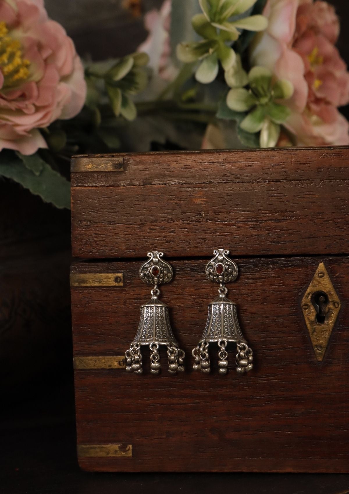 Saarika Silver Jhumki Earrings